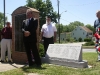 Bill Osborne with the new unveiled monument .