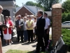 Bill Osborne starts the dedication of the new monument.