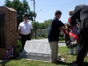 Bill Osborne and his grandson lay wreath
